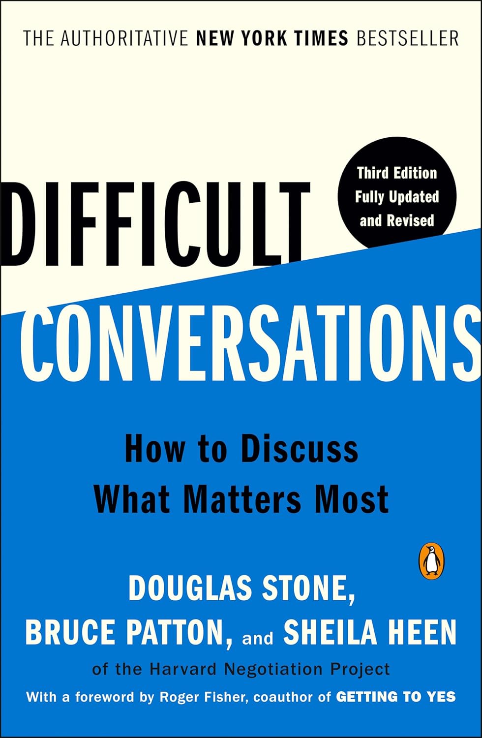 Alt text: Cover of the book *Difficult Conversations: How to Discuss What Matters Most* by Douglas Stone, Bruce Patton, and Sheila Heen. The cover features a two-tone design with an off-white upper half and a blue lower half. It includes the subtitle “Third Edition Fully Updated and Revised” in a black circle on the right side, with the Penguin Books logo at the bottom corner.